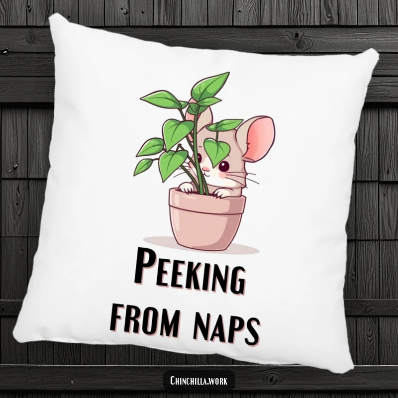 Funny chinchilla pillow with a peek-a-boo rodent hiding behind office greenery, offering comfort and humor.