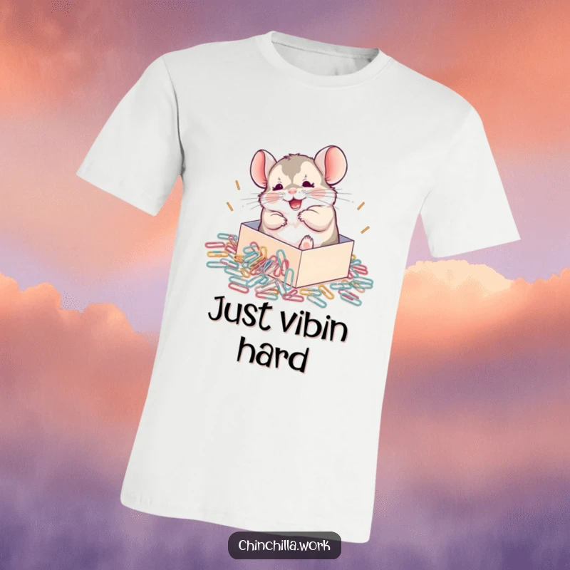 Funny Chinchilla T-Shirt showing a happy chinchilla ecstatically rolling in a large pile of spilled paperclips, a very funny design.