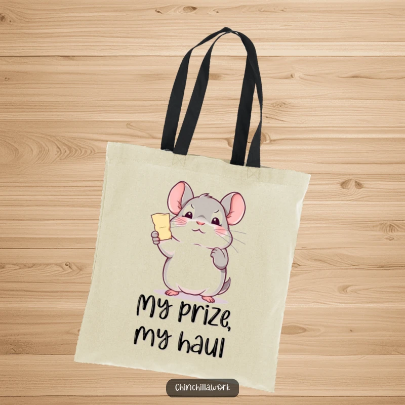 Funny office chinchilla tote bag, triumphantly holding a paper shred, perfect for carrying essentials and celebrating wins.